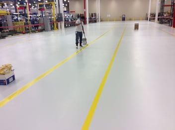 Warehouse floor line striping installation.jpg