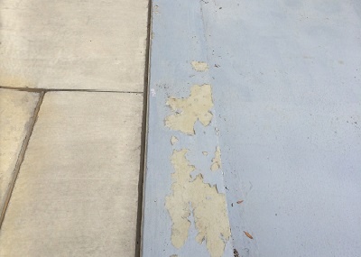 Peeling floor coating due to moisture